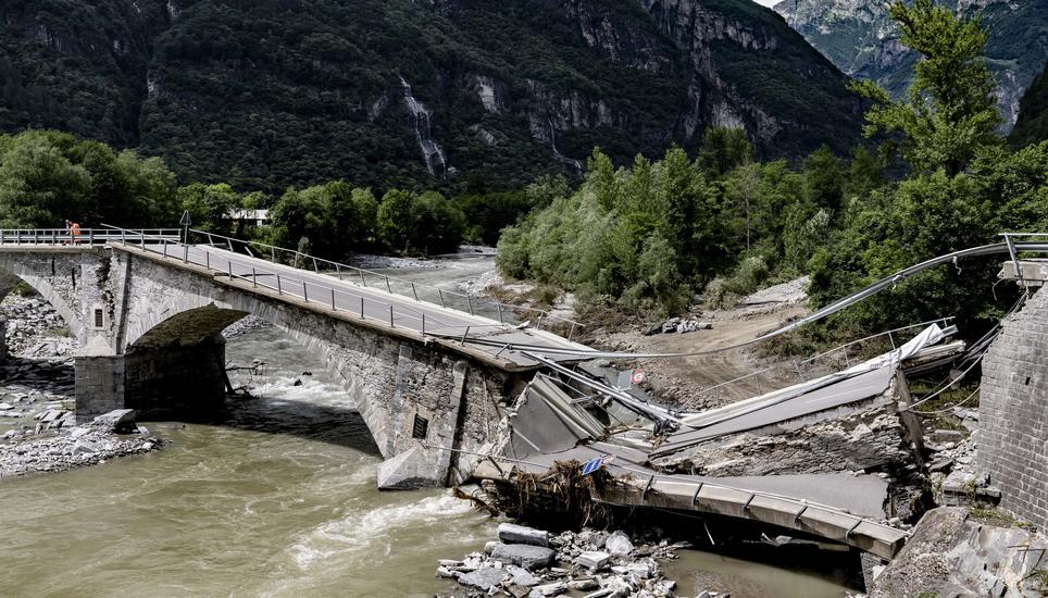 The collapsed Visletto bridge between Visletto and Cevio, in the Maggia Valley pictured after bad weather, in Visletto, Switzerland, Monday, July 1, 2024. Severe storms and torrential rain in Switzerland over the weekend left three people dead in Val Magg
