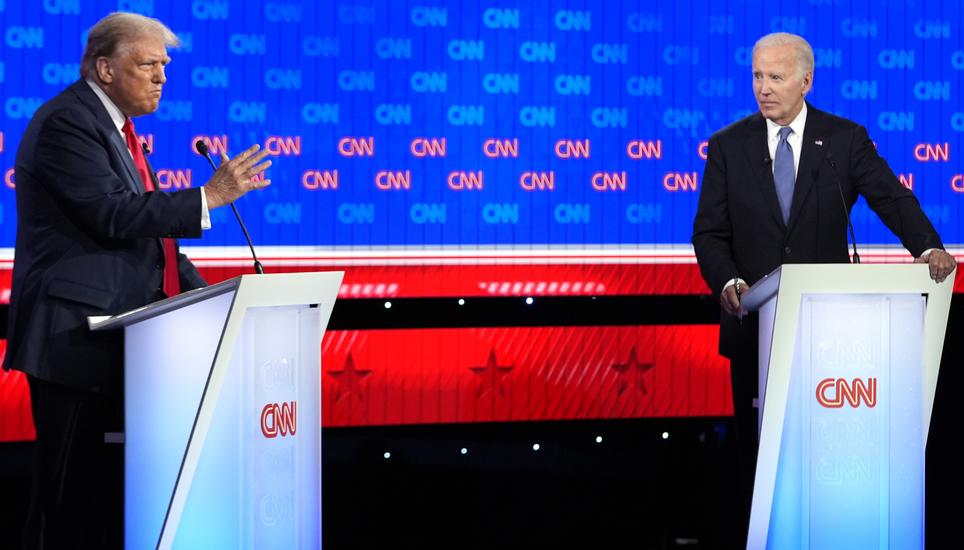 President Joe Biden, right, and Republican presidential candidate former President Donald Trump, left, participate in a presidential debate hosted by CNN, Thursday, June 27, 2024, in Atlanta. (AP Photo/Gerald Herbert)