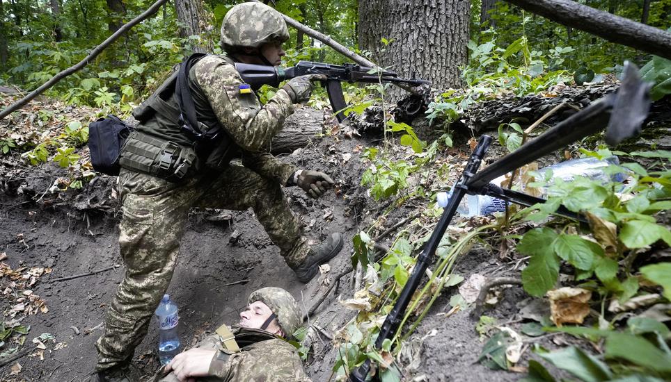 Ukrainian soldiers from the 3rd Spartan Task Force Brigade are taking part in tactical and medical training exercises at an undisclosed location in Kharkiv region, Ukraine, Monday, July 22, 2024. (AP Photo/Andrii Marienko)