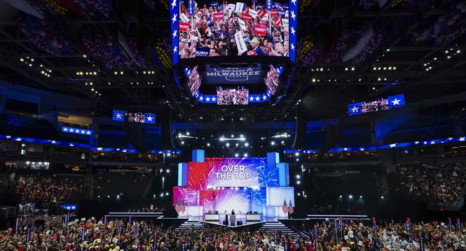epa11480503 Delegates celebrate as Florida's votes put former president Donald J. Trump over the top during the nomination process for former President Donald J. Trump at the Republican National Convention (RNC) in the Fiserv Forum in Milwaukee, Wisconsin